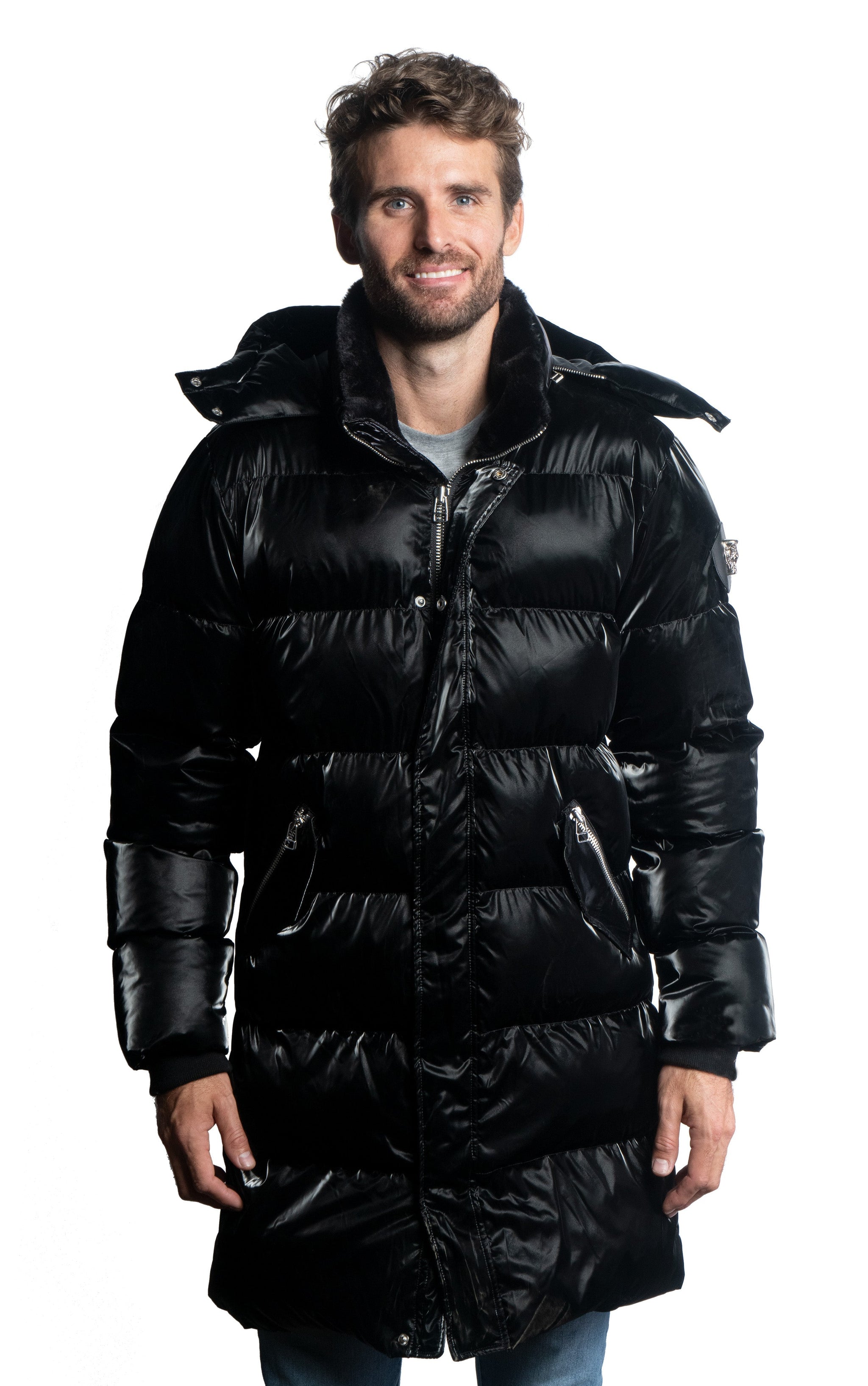 Woodpecker Men's Penguin Long Winter coat. High-end Canadian designer winter coat for men in shiny "All Wet Black" colour. Woodpecker cruelty-free winter coat designed in Canada. Men's heavy weight long length premium designer jacket for winter. Superior quality warm winter coat for men. Moose Knuckles, Canada Goose, Mackage, Montcler, Will Poho, Willbird, Nic Bayley