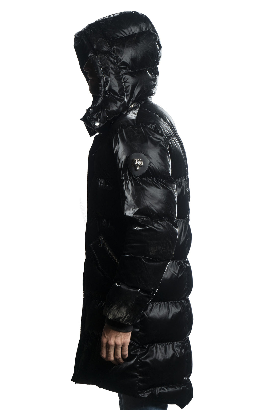 Woodpecker Men's Penguin Long Winter coat. High-end Canadian designer winter coat for men in shiny "All Wet Black" colour. Woodpecker cruelty-free winter coat designed in Canada. Men's heavy weight long length premium designer jacket for winter. Superior quality warm winter coat for men. Moose Knuckles, Canada Goose, Mackage, Montcler, Will Poho, Willbird, Nic Bayley