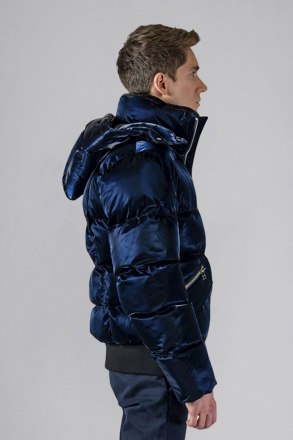 Woodpecker Men's Woody Bomber Winter coat. High-end Canadian designer winter coat for men in shiny “All Wet Navy" colour. Woodpecker cruelty-free winter coat designed in Canada. Men's heavy weight short length premium designer jacket for winter. Superior quality warm winter coat for men. Moose Knuckles, Canada Goose, Mackage, Montcler, Will Poho, Willbird, Nic Bayley. Shiny parka. Stylish winter jacket. Designer winter coat.