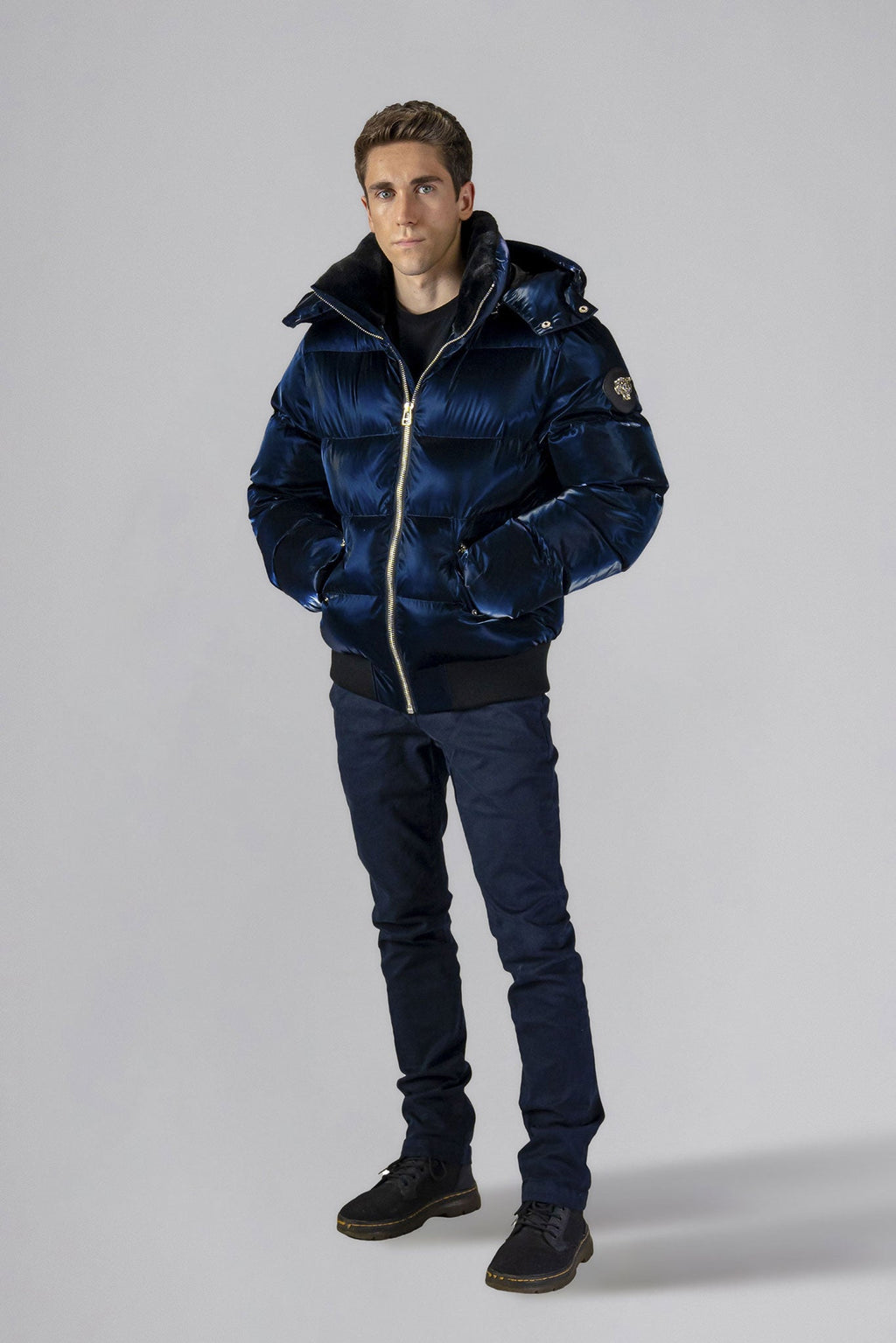 Woodpecker Men's Woody Bomber Winter coat. High-end Canadian designer winter coat for men in shiny “All Wet Navy" colour. Woodpecker cruelty-free winter coat designed in Canada. Men's heavy weight short length premium designer jacket for winter. Superior quality warm winter coat for men. Moose Knuckles, Canada Goose, Mackage, Montcler, Will Poho, Willbird, Nic Bayley. Shiny parka. Stylish winter jacket. Designer winter coat.