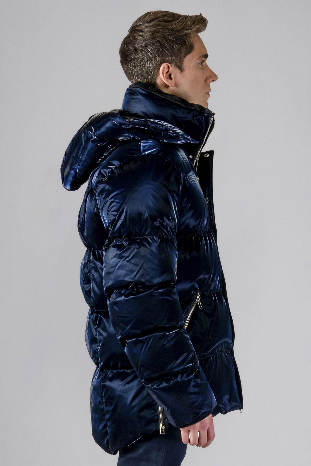 Woodpecker Men's Bumnester Winter coat. High-end Canadian designer winter coat for men in "All Wet Navy" colour. Woodpecker cruelty-free winter coat designed in Canada. Men's heavy weight medium length premium designer jacket for winter. Superior quality warm winter coat for men. Moose Knuckles, Canada Goose, Mackage, Montcler, Will Poho, Willbird, Nic Bayley. Shiny parka. Stylish winter jacket. Designer winter coat.