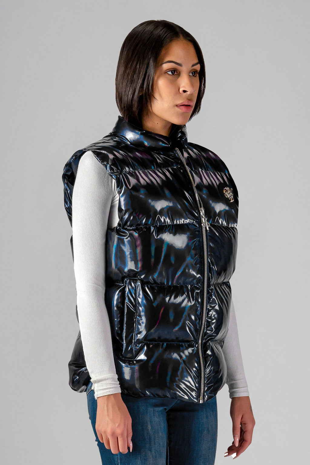 Woodpecker Unisex Winter Vest. High-end Canadian designer winter vest in "Oily Black" colour. Woodpecker cruelty-free vest designed in Canada. Heavy weight short length premium designer vest for winter. Superior quality warm winter vest. Moose Knuckles, Canada Goose, Mackage, Montcler, Will Poho, Willbird, Nic Bayley. Extra warm. Shiny vest. Stylish winter vest. Designer winter vest.