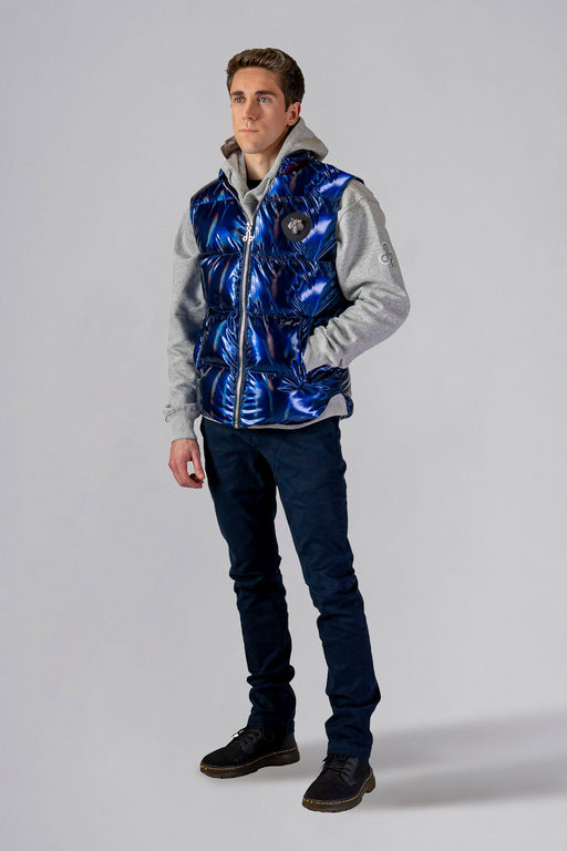 Woodpecker Unisex Winter Vest. High-end Canadian designer winter vest in "Oily Blue" colour. Woodpecker cruelty-free vest designed in Canada. Heavy weight short length premium designer vest for winter. Superior quality warm winter vest. Moose Knuckles, Canada Goose, Mackage, Montcler, Will Poho, Willbird, Nic Bayley. Extra warm. Shiny vest. Stylish winter vest. Designer winter vest.