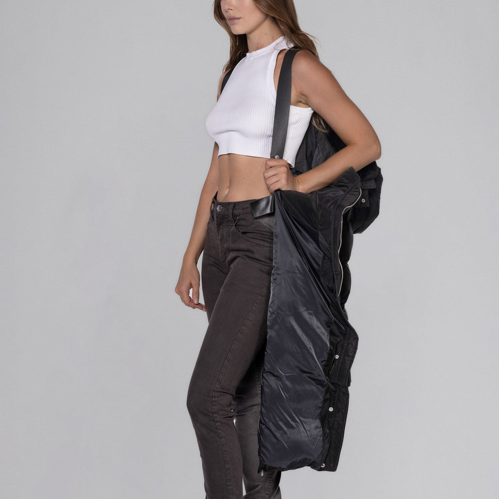 Woodpecker Women's Extra Long Bird of Paradise Winter coat. High-end Canadian designer winter coat for women in "Black Diamond" colour. Woodpecker cruelty-free winter coat designed in Canada. Women's heavy weight extra long length premium designer jacket for winter. Superior quality warm winter coat for women. Moose Knuckles, Canada Goose, Mackage, Montcler, Will Poho, Willbird, Nic Bayley