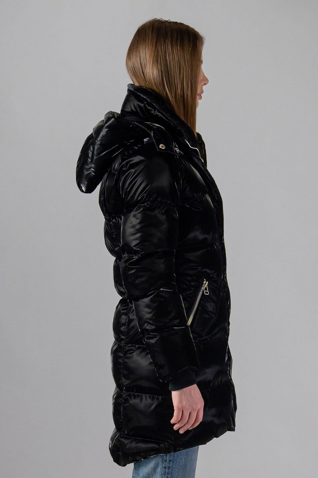 Woodpecker Women's Penguin Long Winter coat. High-end Canadian designer winter coat for women in "All Wet Black" colour. Woodpecker cruelty-free winter coat designed in Canada. Women's heavy weight long length premium designer jacket for winter. Superior quality warm winter coat for women. Moose Knuckles, Canada Goose, Mackage, Montcler, Will Poho, Willbird, Nic Bayley. Extra warm. Shiny parka. Stylish winter jacket. Designer winter coat.