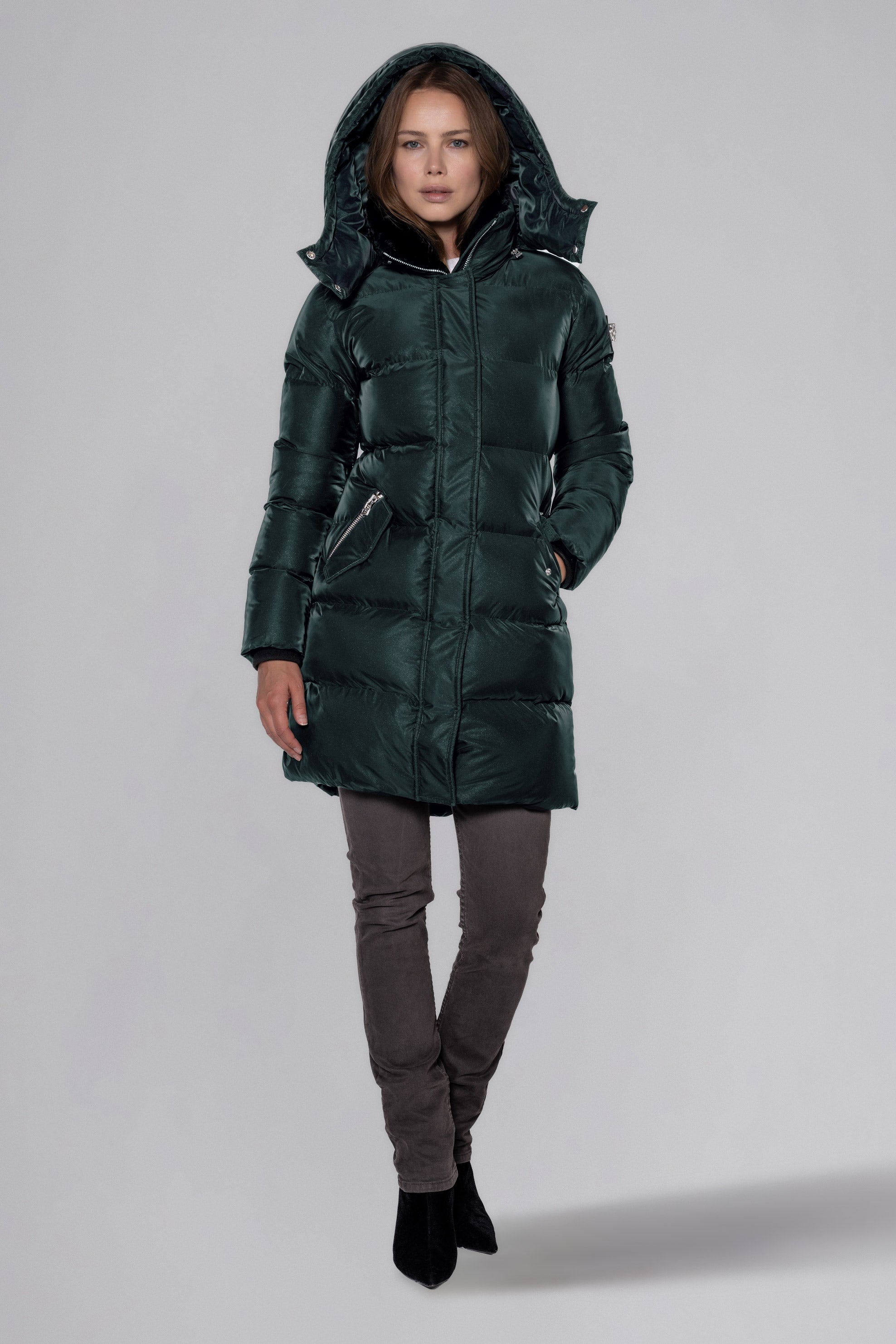 Woodpecker Women's Penguin Long Winter coat. High-end Canadian designer winter coat for women in "Green Diamond" colour. Woodpecker cruelty-free winter coat designed in Canada. Women's heavy weight long length premium designer jacket for winter. Superior quality warm winter coat for women. Moose Knuckles, Canada Goose, Mackage, Montcler, Will Poho, Willbird, Nic Bayley