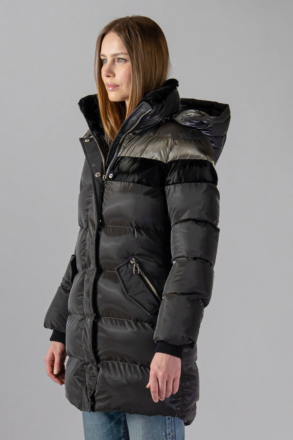 Woodpecker Women's Penguin Long Winter coat. High-end Canadian designer winter coat for women in "Magnum" Grey colour. Woodpecker cruelty-free winter coat designed in Canada. Women's heavy weight long length premium designer jacket for winter. Superior quality warm winter coat for women. Moose Knuckles, Canada Goose, Mackage, Montcler, Will Poho, Willbird, Nic Bayley. Extra warm. Shiny parka. Stylish winter jacket. Designer winter coat.