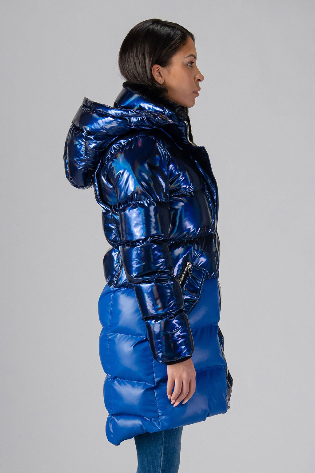 Woodpecker Women's Penguin Long Winter coat. High-end Canadian designer winter coat for women in "Oily Blue Blue" colour. Woodpecker cruelty-free winter coat designed in Canada. Women's heavy weight long length premium designer jacket for winter. Superior quality warm winter coat for women. Moose Knuckles, Canada Goose, Mackage, Montcler, Will Poho, Willbird, Nic Bayley. Extra warm. Shiny parka. Stylish winter jacket. Designer winter coat.