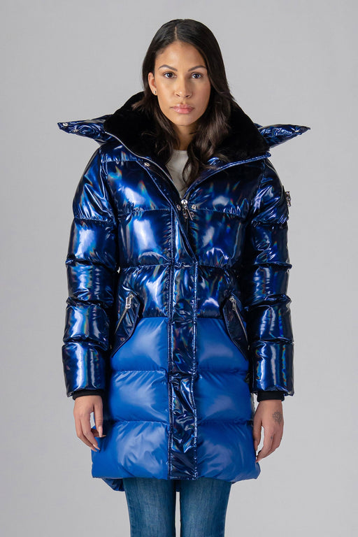 Woodpecker Women's Penguin Long Winter coat. High-end Canadian designer winter coat for women in "Oily Blue Blue" colour. Woodpecker cruelty-free winter coat designed in Canada. Women's heavy weight long length premium designer jacket for winter. Superior quality warm winter coat for women. Moose Knuckles, Canada Goose, Mackage, Montcler, Will Poho, Willbird, Nic Bayley. Extra warm. Shiny parka. Stylish winter jacket. Designer winter coat.