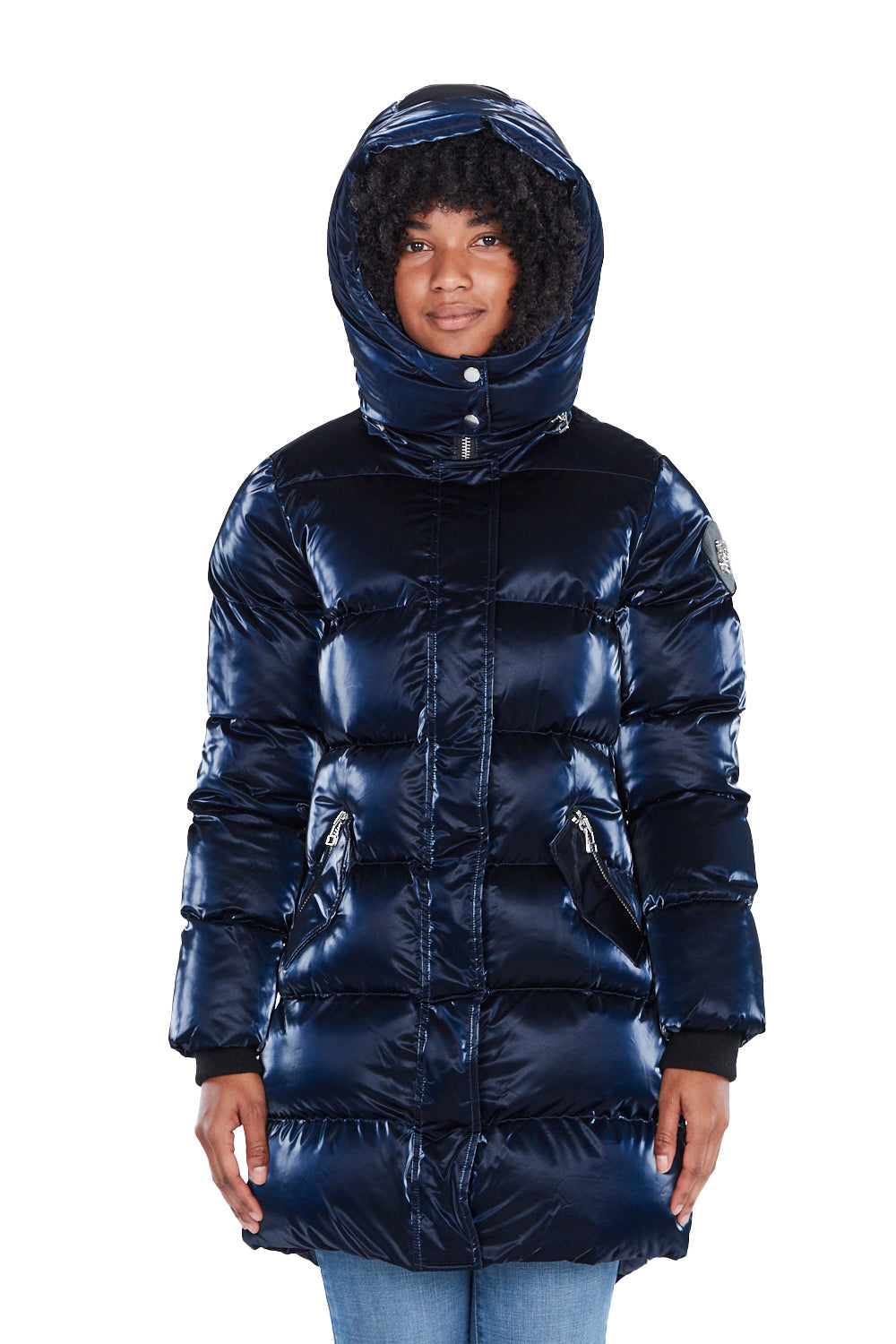 Woodpecker Women's Penguin Long Winter coat. High-end Canadian designer winter coat for women in shiny "All Wet Navy" blue colour. Woodpecker cruelty-free winter coat designed in Canada. Women's heavy weight long length premium designer jacket for winter. Superior quality warm winter coat for women. Moose Knuckles, Canada Goose, Mackage, Montcler, Will Poho, Willbird, Nic Bayley. Extra warm. Shiny parka. Stylish winter jacket. Designer winter coat.