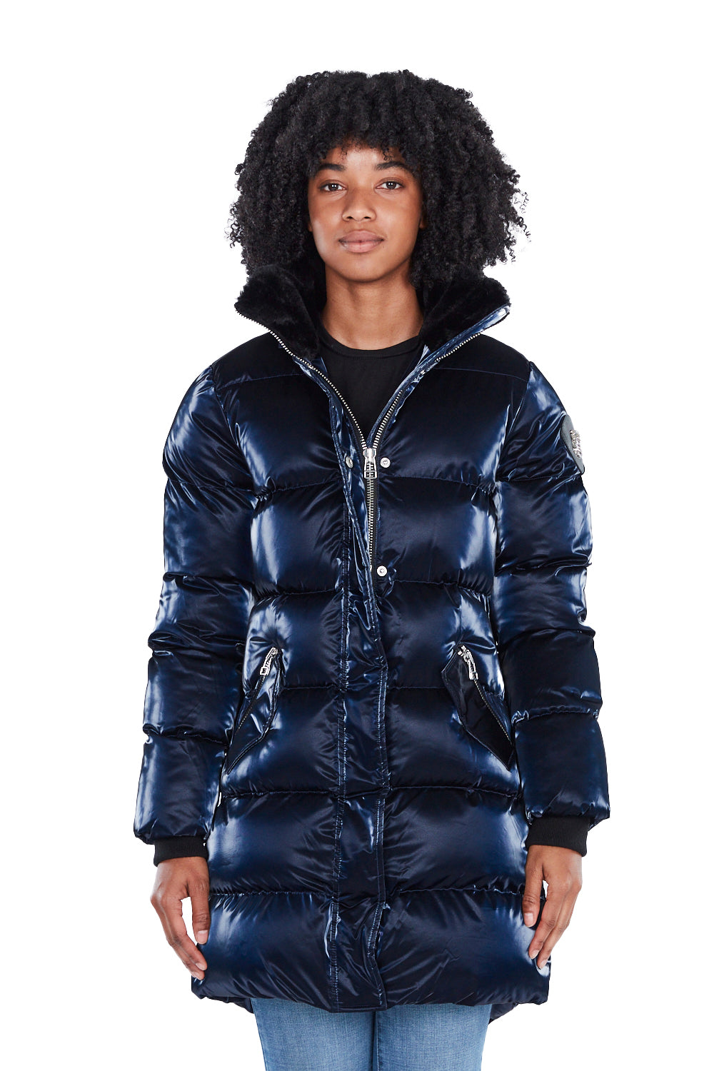 Woodpecker Women's Penguin Long Winter coat. High-end Canadian designer winter coat for women in shiny "All Wet Navy" blue colour. Woodpecker cruelty-free winter coat designed in Canada. Women's heavy weight long length premium designer jacket for winter. Superior quality warm winter coat for women. Moose Knuckles, Canada Goose, Mackage, Montcler, Will Poho, Willbird, Nic Bayley. Extra warm. Shiny parka. Stylish winter jacket. Designer winter coat.