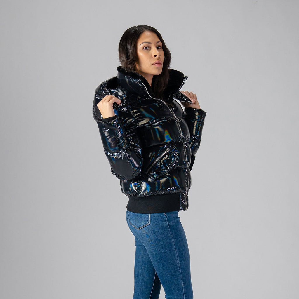 Woodpecker Women's Woody Bomber Winter coat. High-end Canadian designer winter coat for women in "Oily Black" colour. Woodpecker cruelty-free winter coat designed in Canada. Women's heavy weight short length premium designer jacket for winter. Superior quality warm winter coat for women. Moose Knuckles, Canada Goose, Mackage, Montcler, Will Poho, Willbird, Nic Bayley. Shiny parka. Stylish winter jacket. Designer winter coat.