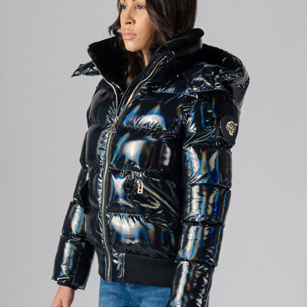 Woodpecker Women's Woody Bomber Winter coat. High-end Canadian designer winter coat for women in "Oily Black" colour. Woodpecker cruelty-free winter coat designed in Canada. Women's heavy weight short length premium designer jacket for winter. Superior quality warm winter coat for women. Moose Knuckles, Canada Goose, Mackage, Montcler, Will Poho, Willbird, Nic Bayley. Shiny parka. Stylish winter jacket. Designer winter coat.