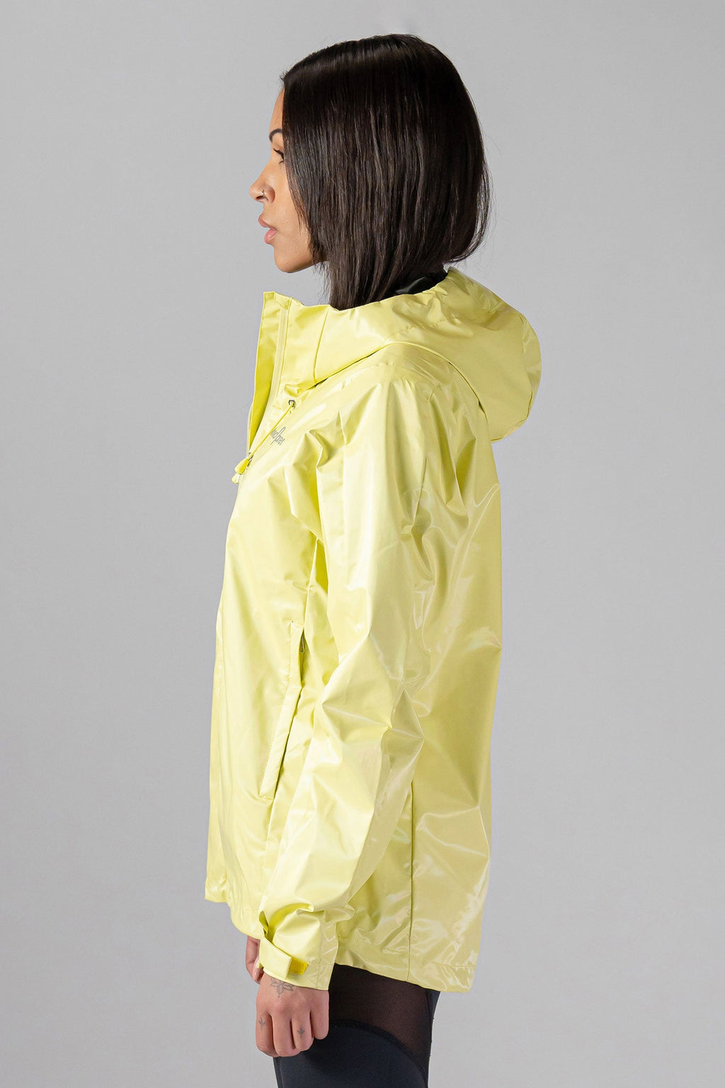 Woodpecker Women's Wind Shell coat. High-end Canadian designer activewear coat for women in "Mellow Yellow" colour. Woodpecker coat designed in Canada. Moose Knuckles, Canada Goose, Mackage, Montcler, Will Poho, Willbird, Nic Bayley.