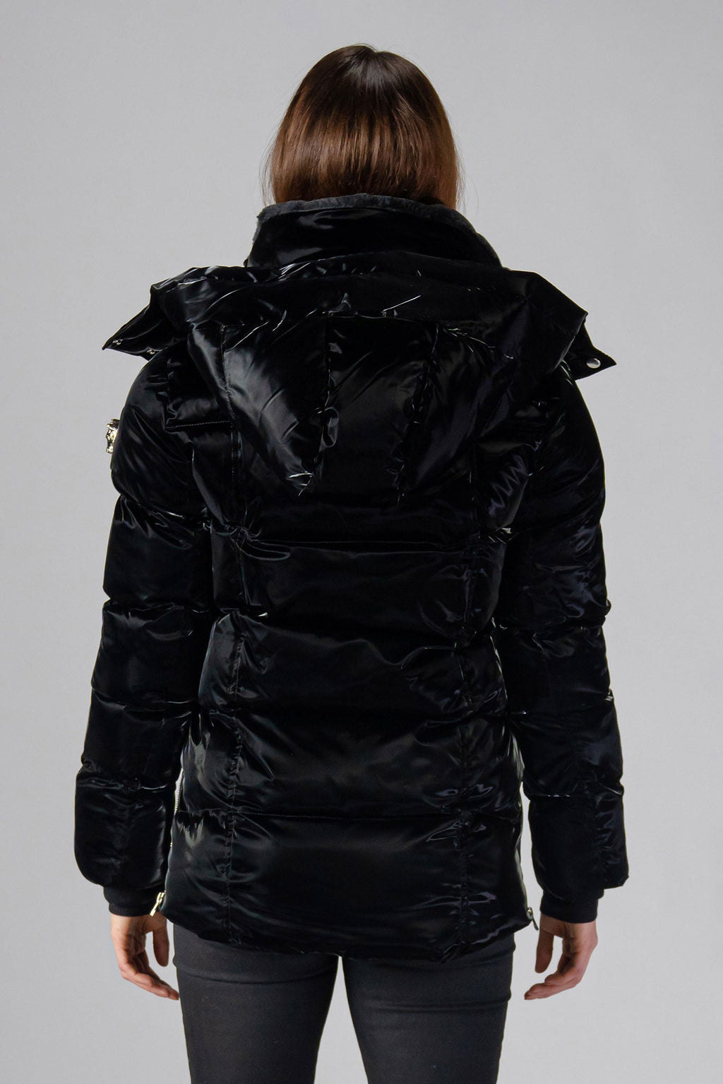 Woodpecker Women's Bumnester Winter coat. High-end Canadian designer winter coat for women in shiny "All Wet Black" colour. Woodpecker cruelty-free winter coat designed in Canada. Women's heavy weight medium length premium designer jacket for winter. Superior quality warm winter coat for women. Moose Knuckles, Canada Goose, Mackage, Montcler, Will Poho, Willbird, Nic Bayley. Extra warm. Shiny parka. Stylish winter jacket. Designer winter coat.