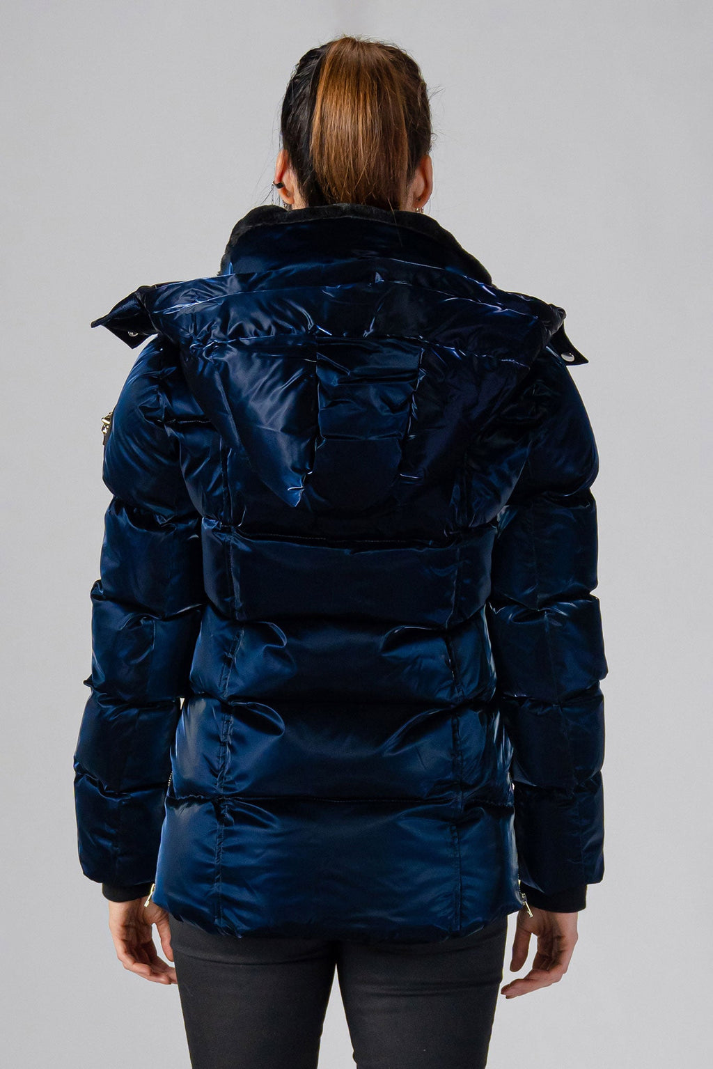 Woodpecker Women's Bumnester Winter coat. High-end Canadian designer winter coat for women in shiny "All Wet Navy" colour. Woodpecker cruelty-free winter coat designed in Canada. Women's heavy weight medium length premium designer jacket for winter. Superior quality warm winter coat for women. Moose Knuckles, Canada Goose, Mackage, Montcler, Will Poho, Willbird, Nic Bayley. Extra warm. Shiny parka. Stylish winter jacket. Designer winter coat.