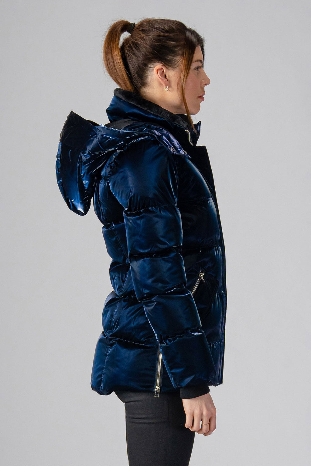 Woodpecker Women's Bumnester Winter coat. High-end Canadian designer winter coat for women in shiny "All Wet Navy" colour. Woodpecker cruelty-free winter coat designed in Canada. Women's heavy weight medium length premium designer jacket for winter. Superior quality warm winter coat for women. Moose Knuckles, Canada Goose, Mackage, Montcler, Will Poho, Willbird, Nic Bayley. Extra warm. Shiny parka. Stylish winter jacket. Designer winter coat.