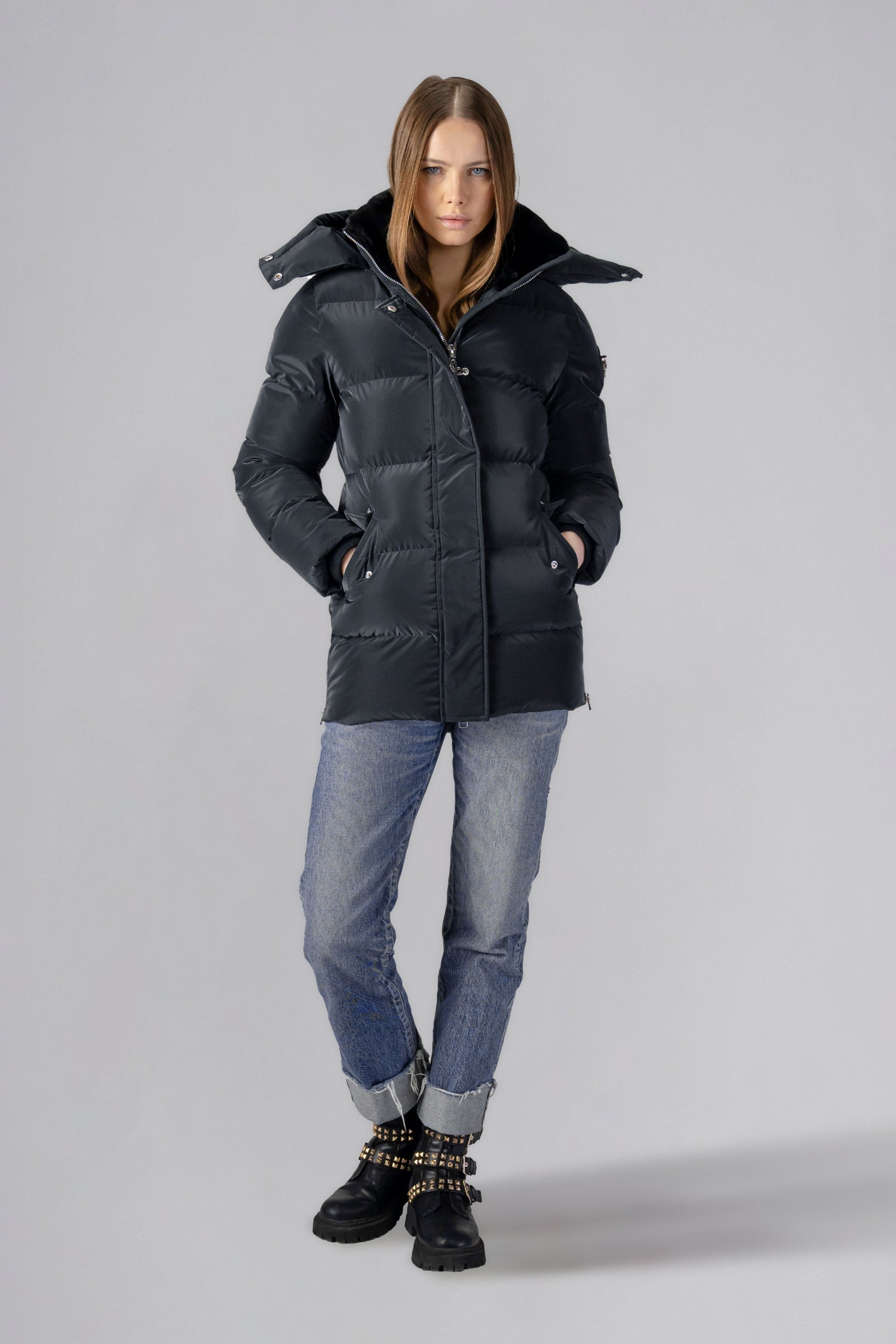 Woodpecker Women's Bumnester Winter coat. High-end Canadian designer winter coat for women in shiny "Black Diamond" colour. Woodpecker cruelty-free winter coat designed in Canada. Women's heavy weight medium length premium designer jacket for winter. Superior quality warm winter coat for women. Moose Knuckles, Canada Goose, Mackage, Montcler, Will Poho, Willbird, Nic Bayley. Extra warm. Shiny parka. Stylish winter jacket. Designer winter coat.