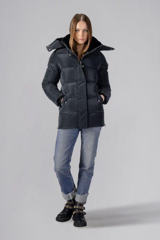 Woodpecker Women's Bumnester Winter coat. High-end Canadian designer winter coat for women in shiny "Black Diamond" colour. Woodpecker cruelty-free winter coat designed in Canada. Women's heavy weight medium length premium designer jacket for winter. Superior quality warm winter coat for women. Moose Knuckles, Canada Goose, Mackage, Montcler, Will Poho, Willbird, Nic Bayley. Extra warm. Shiny parka. Stylish winter jacket. Designer winter coat.